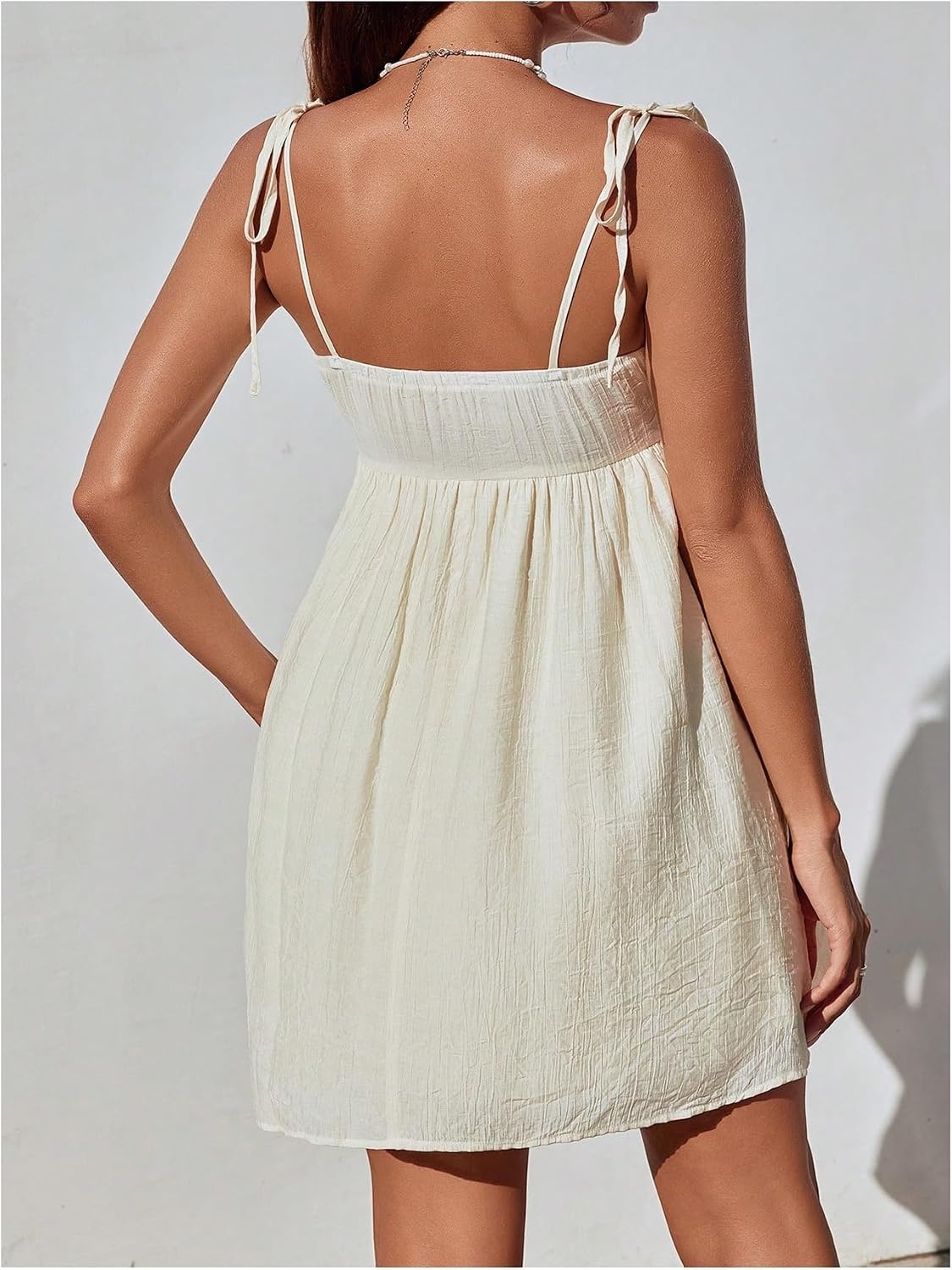 image:imageFloerns Womens Bowknot Tie Shoulder Cami Dress Sleeveless A Line Vacation Mini DressesApricot